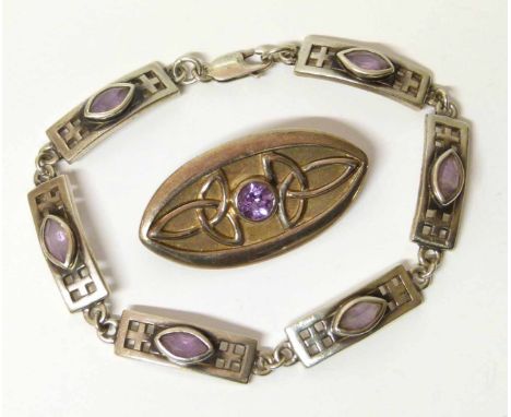 Celtic design silver and amethyst brooch and bracelet We are unable to provide condition reports for this sale.