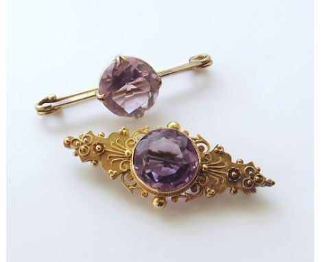 Amethyst 15ct gold brooch and another amethyst brooch We are unable to provide condition reports for this sale.