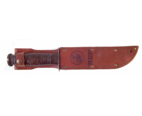 US Marine Corps KA-BAR fighting knife and leather scabbard, 33cm overall length We are unable to provide condition reports fo