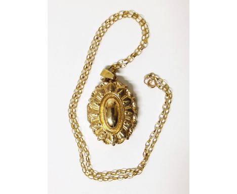 A 9ct gold pendant locket and chain We are unable to provide condition reports for this sale.