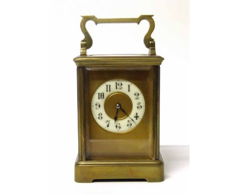 Brass carriage clock with white enammeled chapter ring with striking gold We are unable to provide condition reports for this