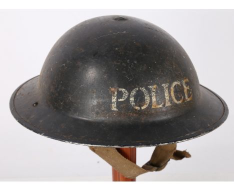 Second World War Police issue Mk II steel helmet, blue paint finish with 'POLICE' stencilled in white to front, inside rim st