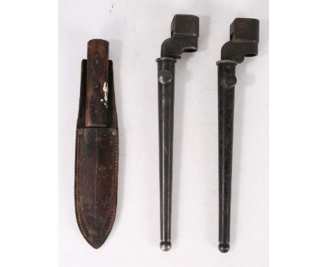 A Second World War British No.4 Mk II Spike Bayonet, held in a Mk I scabbard, together with a similar No.4 Mk II Bayonet and 