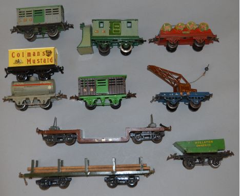 O Gauge Hornby. 10 x assorted rolling stock. Including snow plough, trolley wagon, restored Colman's mustard van, etc. Varyin