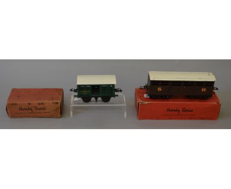 O Gauge. Hornby. No.1 Milk Traffic Van Southern 2435 & No.2 Cattle Truck SR brown, goldv lettering. Overall F/G