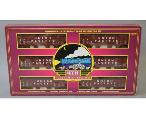 O Gauge. MTH electric trains. Union Pacific 4 bay hopper 6 car set. Overall G boxed.