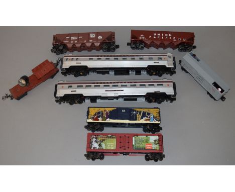 O Gauge. 8 x unboxed American outline rolling stock. Including MTH (USA) illuminated 3 rail coaches. Overall G