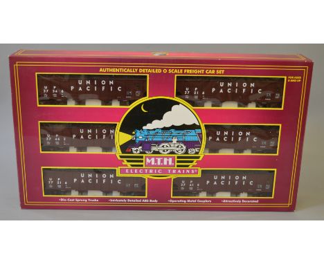 O Gauge. MTH electric trains. Union Pacific 4 bay hopper 6 car set. Overall G boxed.