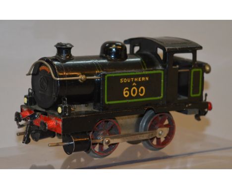 O Gauge. Hornby. No.1 0-4-0 clockwork tank engine. Southern black livery. A600. In F unrestored condition. With tape repaired