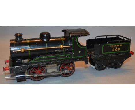 O Gauge. Hornby. No.0 clockwork 0-4-0 tender engine. Southern black livery E509. Overall F/G unrestored condition.