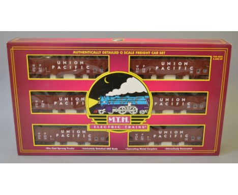 O Gauge. MTH electric trains. Union Pacific 4 bay hopper 6 car set. Overall G boxed.