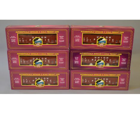 O Gauge. MTH electric trains. 6 x Union Pacific 4 bay hopper cars. Overall G boxed.