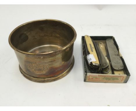 Shipping interest, a Star Line First Class bottle stand and a collection of nine pocket folding knives (10)