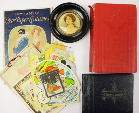An autograph book containing autographs of cricketers including N.W.D. Yardley, L. Hutton and W.J. Edrich together with early