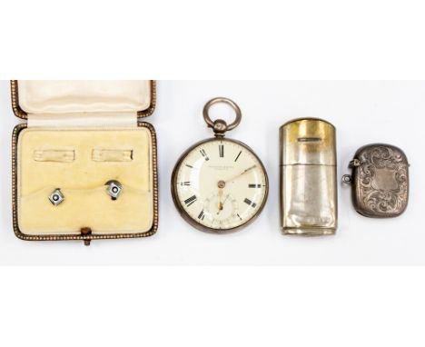 A silver pocket watch, small silver vesta case, a boxed pair of white metal dress studs and a cigarette lighter, Edwardian