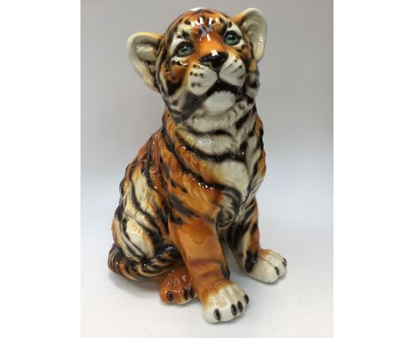  A large ceramic tiger cub, approx 58cms high