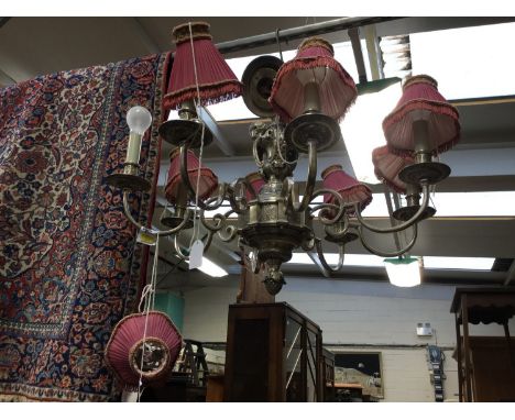  A large cast metal, eight branch ceiling light fitting with Putti to centre together with two matching wall light fittings (