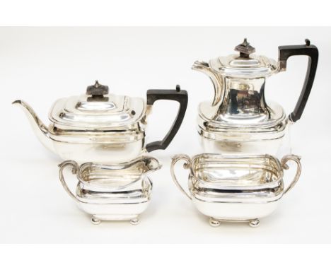 A 20th century four piece silver tea set comprising a tea pot, water pot, sugar bowl and milk jug, Sheffield 1919 George Hows