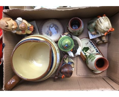 A Mottoware jug and cruet set, two Goebel Hummel miniature plates and four Goebel Hummel figurines (8) 