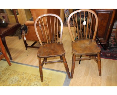 A set of four early 20th Century elm and beech stick back Windsor chairs (4)