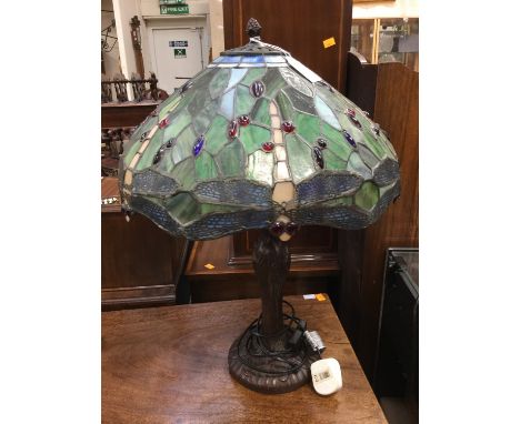 A Tiffany style table lamp, in the Art Nouveau style, 55 cm high approx 