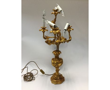 A 20th Century Baroque styled candelabra 