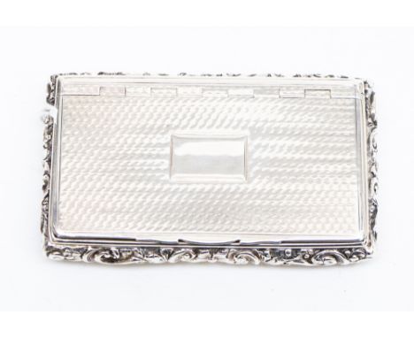  A William IV silver snuff box, gilt interior, the body engraved with foliate and scroll border, the engine turned cover with