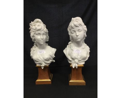 A pair of Royal Worcester 1970 limited edition 104/250 Blanc de Chine busts, on hardwood and gilded plinths, Night and Day, d