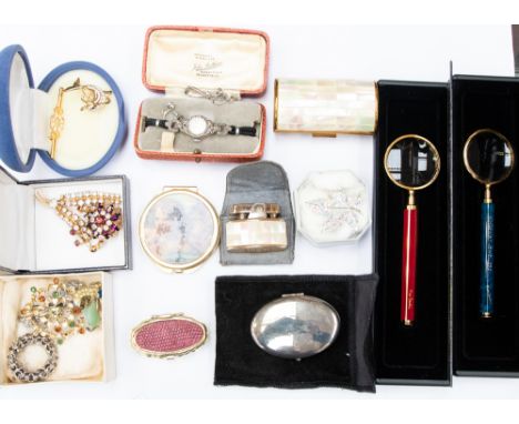 Brooches, magnifying glasses, cocktail watch (1930s)and earrings, cigarette lighter and matching case, mother of pearl covere