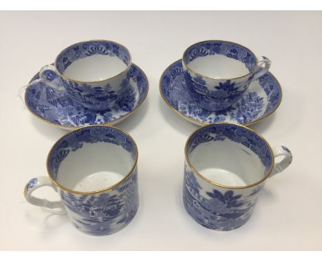 Two Spode blue and white trios, circa 1820, comprising tea cups, coffee cans and saucers (6) 
