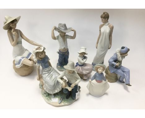 A collection of seven Nao figurines, mostly of children (7)