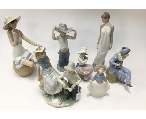 A collection of seven Nao figurines, mostly of children (7)