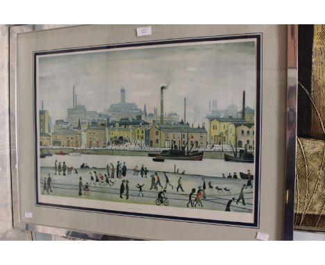 A framed and glazed print 'Northern River scene' L.S. Lowry 
