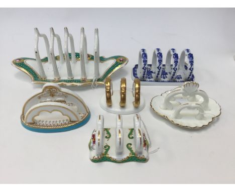 A collection of six late 19th Century/early 20th Century toast racks to include Royal Worcester circa 1883, Mintons circa 190