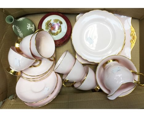 A tea service pink (china) ground (Tuscan) with gilt detail, Limoges circular box and cover and Jasperware bottle vase (1 box