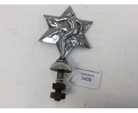 An Art Deco car mascot in the form of a dancing woman with a star, made by Joseph Fray Ltd, Birmingham, who made Bentley car 