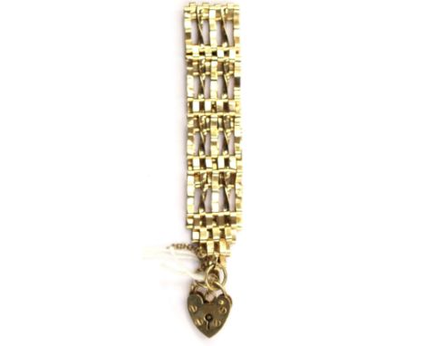 A 9ct gold five bar gate bracelet with padlock fastener, weight approx 11.1 grams