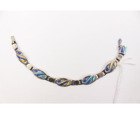 An Art Deco silver enamelled bracelet, Birmingham 1908, with alternate ovals enameled with blue and turquoise details, box cl