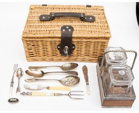 An Edwardian conserve set, mounted in a wooden stand with banding and twist handle together with a breadfork, seven various p