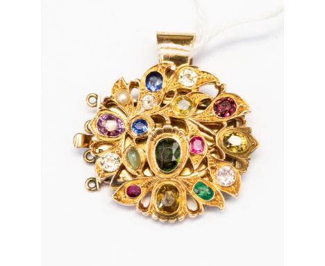 A yellow metal pendant (assessed as 14/15ct gold ) and gem set pendant, ethnic design comprising diamond, ruby, emerald, pear