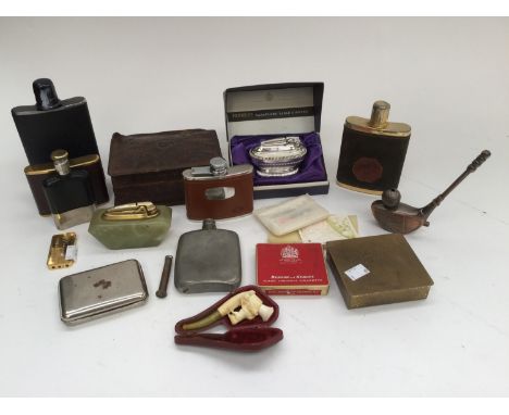 A W.M.F. planished cigarette box, a cased Meerscham pipe, cigarette lighters, leather cigarette box and hip flasks etc (16)