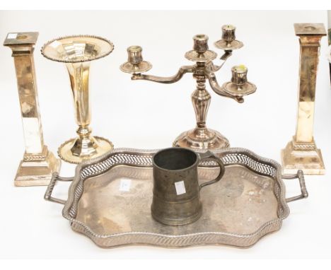 A gallery tray, a candelabra, a pair of columnar candlesticks, a large trumpet vase and a pewter tankard (6) 