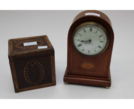An Edwardian mahogany timepiece, Roman numerals to dial; together with an inlaid tea caddy (2) 
