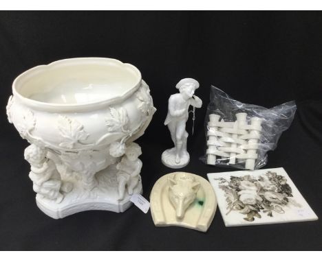 A Copeland Spode table centrepiece, a bowl supported by children and decorated in relief with fruit and vines (af) together w