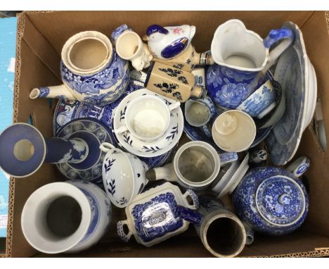 A collection of blue and white ceramics to include a Wedgwood Jasperware candlestick, undecorated Royal Crown Derby, Willow p