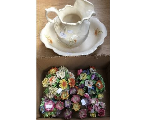 A jug and bowl and five ceramic flower arrangements (7) 