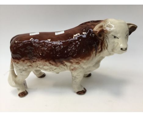 A large ceramic Hereford bull 
