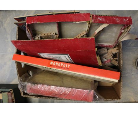 A collection of toys to include Picabrix, Monopoly, Cribbage boards, etc (one box) 