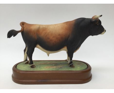 A Royal Worcester limited edition 394/500 Jersey Bull, designed by and signed by Doris Lindner with plinth, box, FRAMED CERTI