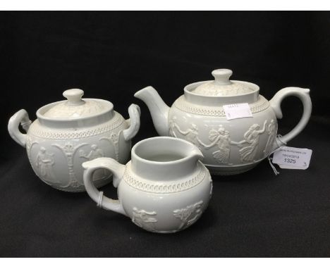 A late 19th Century Dudson Brothers three part tea service comprising teapot, sucrier and milk jug with sprigged decoration d